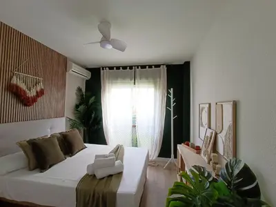 Cama o camas de una habitación en El Palmeral en Aguadulce Apto para 4 personas con AC, Wifi y Piscina