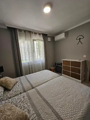 Cama o camas de una habitación en APARTAMENTO VERA COAST 123