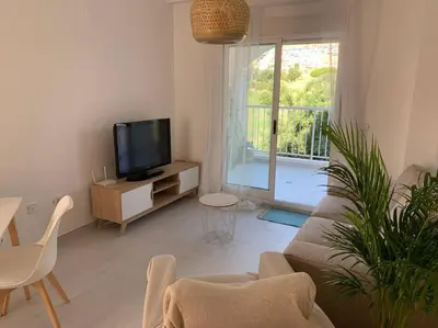 Una televisión o centro de entretenimiento en Golf & Sea Luxe Escape