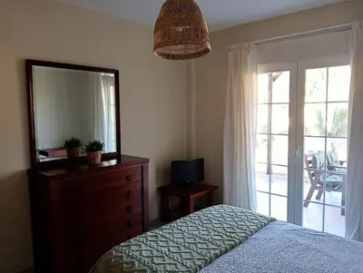 Cama o camas de una habitación en Balcón al mar