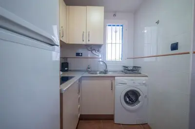 Una cocina o zona de cocina en Apartamento Cala Grande