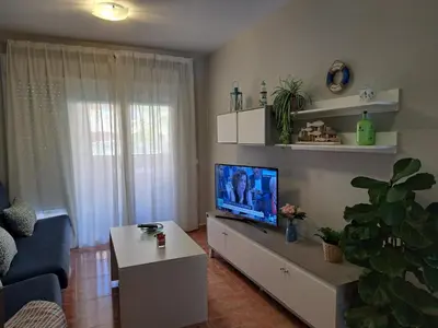 Una televisión o centro de entretenimiento en APARTAMENTO VERA PLAYA