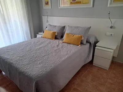 Cama o camas de una habitación en APARTAMENTO VERA PLAYA