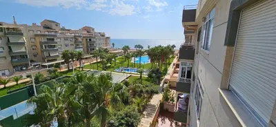 Piscina en o cerca de Apartamento primera linea de Playa Climatizado Internet