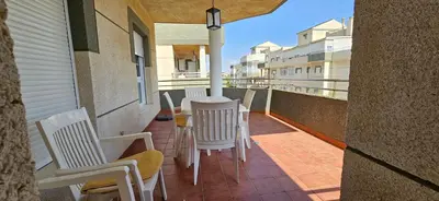 Un balcón o terraza de Apartamento primera linea de Playa Climatizado Internet