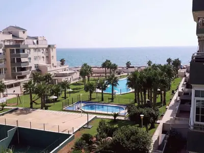Piscina en o cerca de Apartamento primera linea de Playa Climatizado Internet