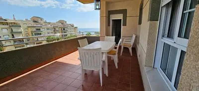 Un balcón o terraza de Apartamento primera linea de Playa Climatizado Internet