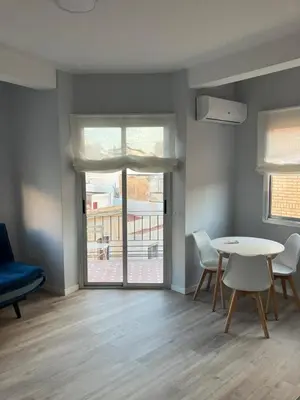 Zona de estar de Tu Playa y tu Casa con terraza