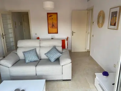Zona de estar de Brisamarina Playa Apartamento