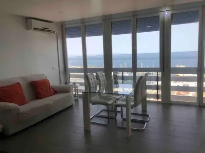 Zona de estar de PRIMERA LÍNEA DE PLAYA, LA ARENA A TUS PIES