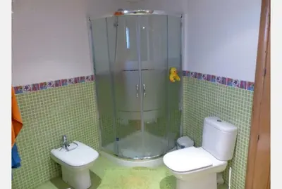 Un baño de Villa Reencuentro