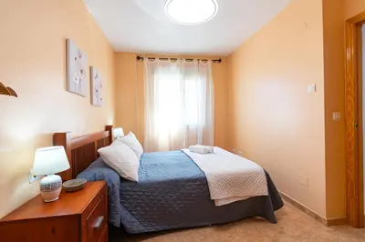 Cama o camas de una habitación en Rincón Levante Águilas, cerca de la playa- by Aloha Palma