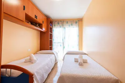 Cama o camas de una habitación en Rincón Levante Águilas, cerca de la playa- by Aloha Palma
