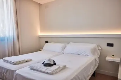 Cama o camas de una habitación en Ancón Suites