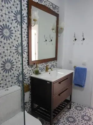 Un baño de Las Palmeras del Cantal