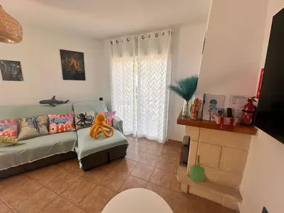Una televisión o centro de entretenimiento en Casa MEDUSA