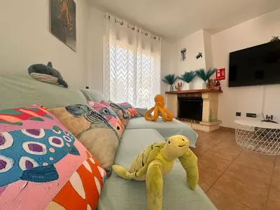 Una televisión o centro de entretenimiento en Casa MEDUSA
