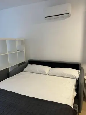Cama o camas de una habitación en Entremares, estudio a 150 metros playa