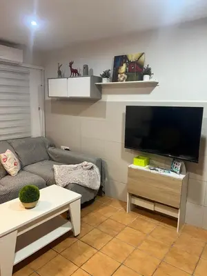 Una televisión o centro de entretenimiento en Casa mis Nietas