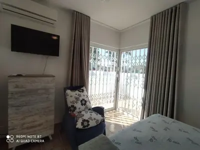 Cama o camas de una habitación en La Casa de las Tejas Verdes