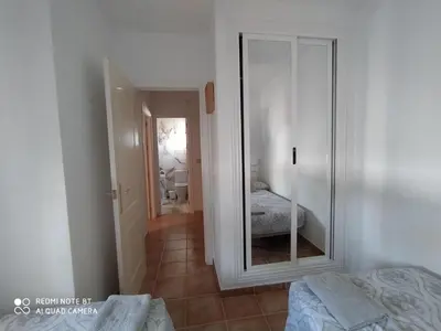 Cama o camas de una habitación en La Casa de las Tejas Verdes