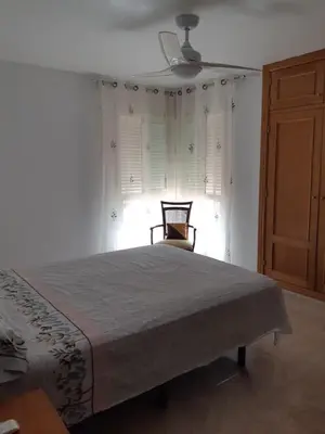 Cama o camas de una habitación en Amplio piso con vistas a la playa de Poniente