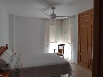 Cama o camas de una habitación en Amplio piso con vistas a la playa de Poniente