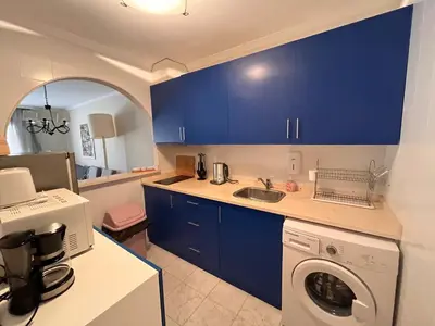Una cocina o zona de cocina en Duplex Vera Coast