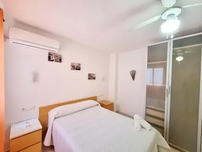 Cama o camas de una habitación en Apartamento céntrico con Aire Acondicionado y Wifi - by Aloha Palma