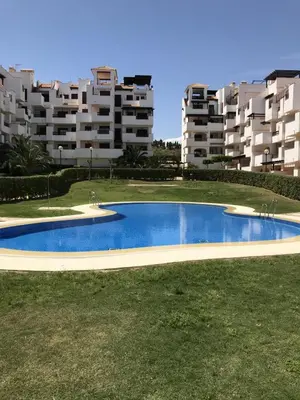 Piscina en o cerca de Apartamento increible, Playazo de Vera, 3 habitaciones, segunda línea de Playa