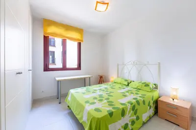 Cama o camas de una habitación en Apartamento increible, Playazo de Vera, 3 habitaciones, segunda línea de Playa
