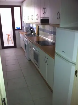 Una cocina o zona de cocina en Apartamento increible, Playazo de Vera, 3 habitaciones, segunda línea de Playa