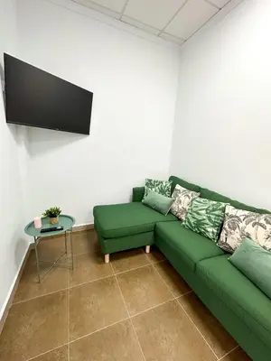 Una televisión o centro de entretenimiento en Casa Almanzora, apartamento de 1 dormitorio, wifi, parking gratuito