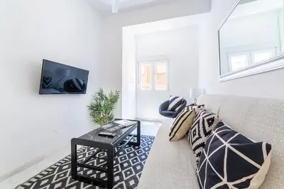 Una televisión o centro de entretenimiento en Trendy Homes Alfarerías