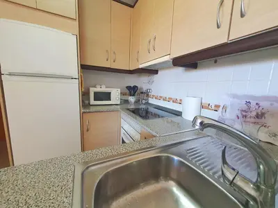 Una cocina o zona de cocina en Bonito apartamento con terraza, piscina y vistas - by Aloha Palma