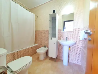 Un baño de Bonito apartamento con terraza, piscina y vistas - by Aloha Palma