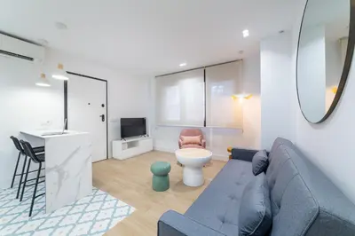Una televisión o centro de entretenimiento en Exclusivo Loft Catedral