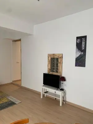 Una televisión o centro de entretenimiento en Las Casas Rurales de Los Olivos
