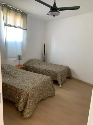 Cama o camas de una habitación en Las Casas Rurales de Los Olivos