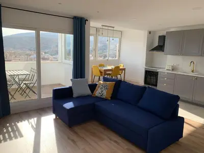 Una cocina o zona de cocina en ATICO PASEO DE ALMERÍA