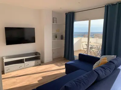 Una televisión o centro de entretenimiento en ATICO PASEO DE ALMERÍA