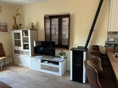 Una televisión o centro de entretenimiento en Apartamento Real 17, Cádiar