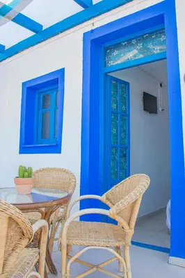 Una televisión o centro de entretenimiento en La Esperanza Beach- Zona Pubs y Restaurantes