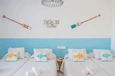 Cama o camas de una habitación en La Esperanza Beach- Zona Pubs y Restaurantes