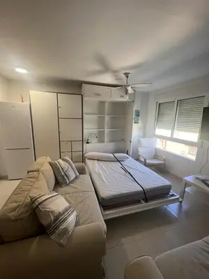 Cama o camas de una habitación en ESTUDIO PLAYA LA BAJADILLA Roquetas de mar