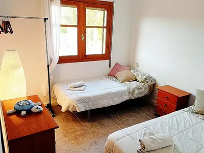Cama o camas de una habitación en ATICO ESTUPENDO