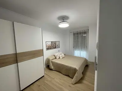Cama o camas de una habitación en Clauadris Home ideal para familias