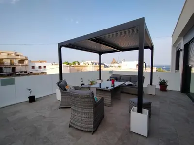 Un balcón o terraza de Ático los cocones