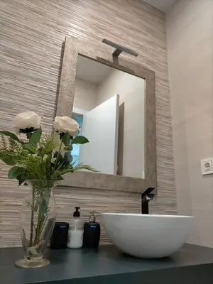 Un baño de Ático los cocones