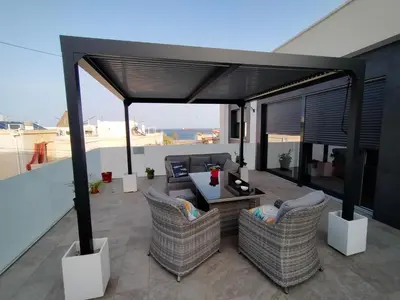 Un balcón o terraza de Ático los cocones